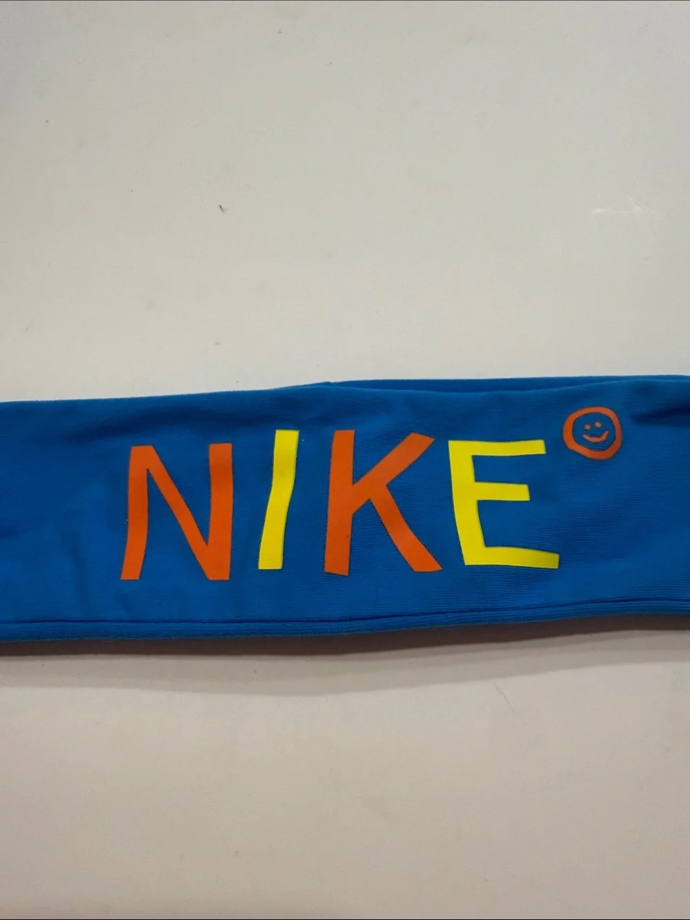 Nike Bright Blue Headband with Orange & Yellow Logo